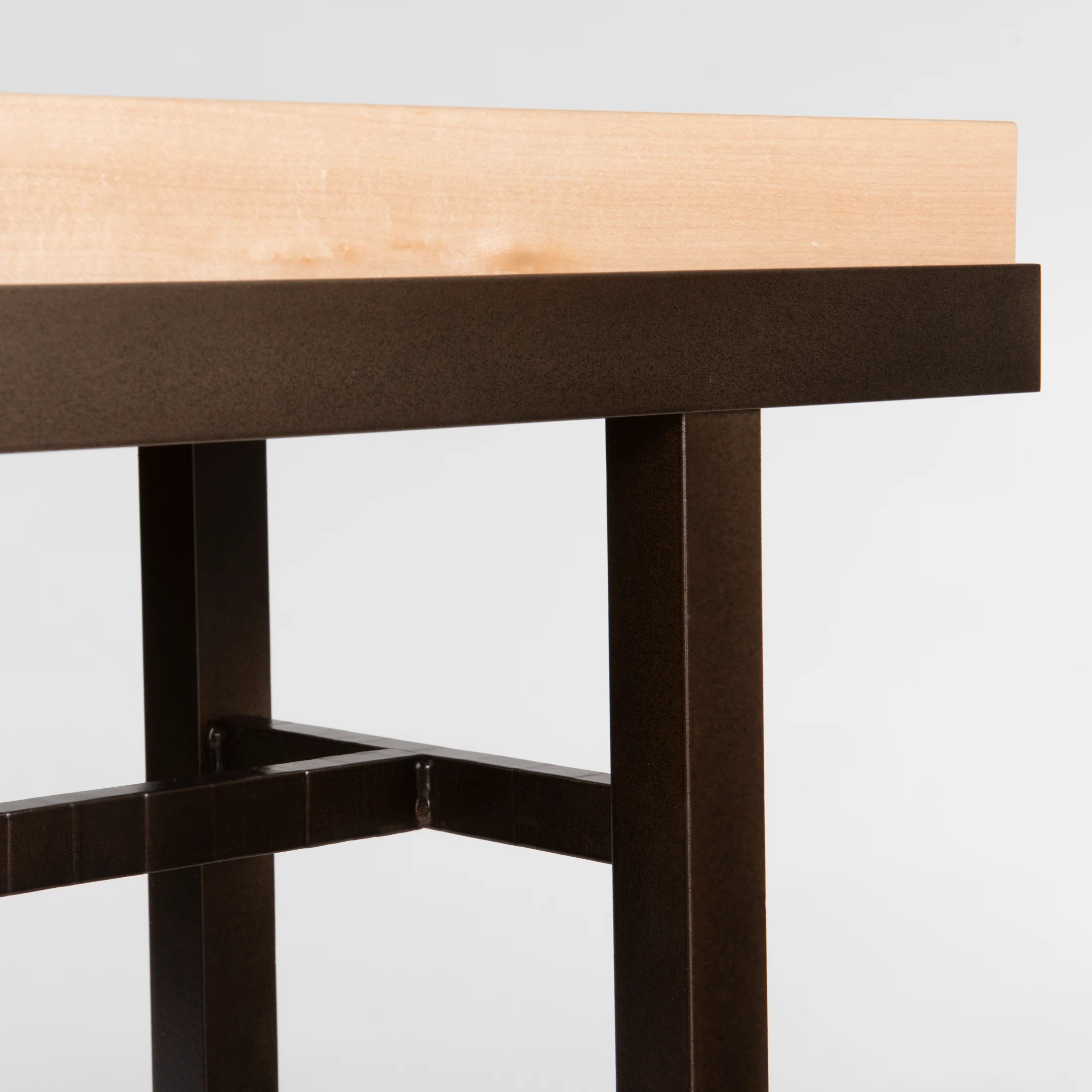 The smallest console table in the Wick Collection, the Wick 30" Console features a 1.5" thick, solid Vermont maple wood top. The maple wood top fits securely, filling the console's narrow steel frame from edge-to-edge. 