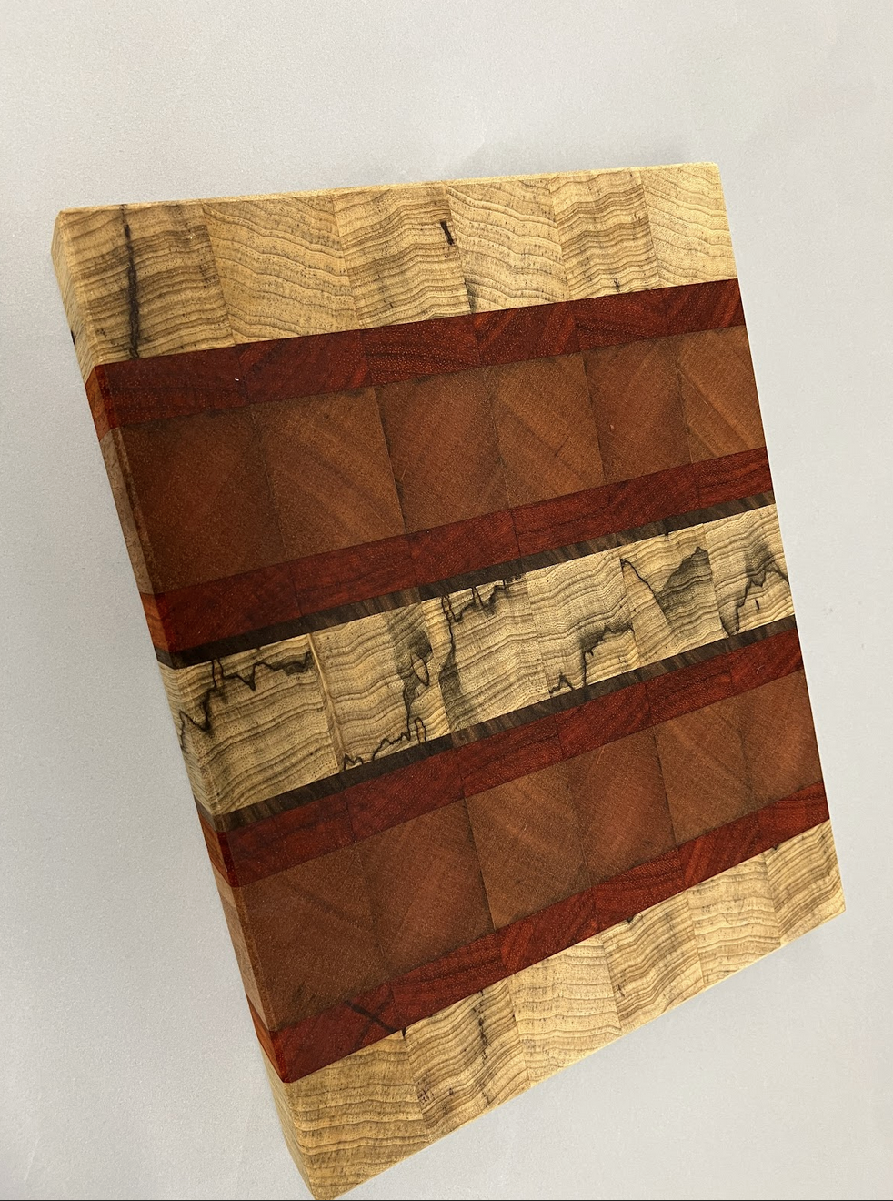 Black Limba , Padauk, Lacewood, Wenge end grain cutting board.