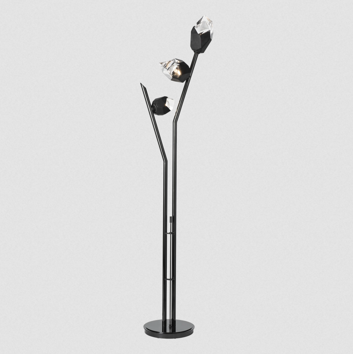 Floor lamp with three thick cut crystal shades and a pole dimmer on the base.