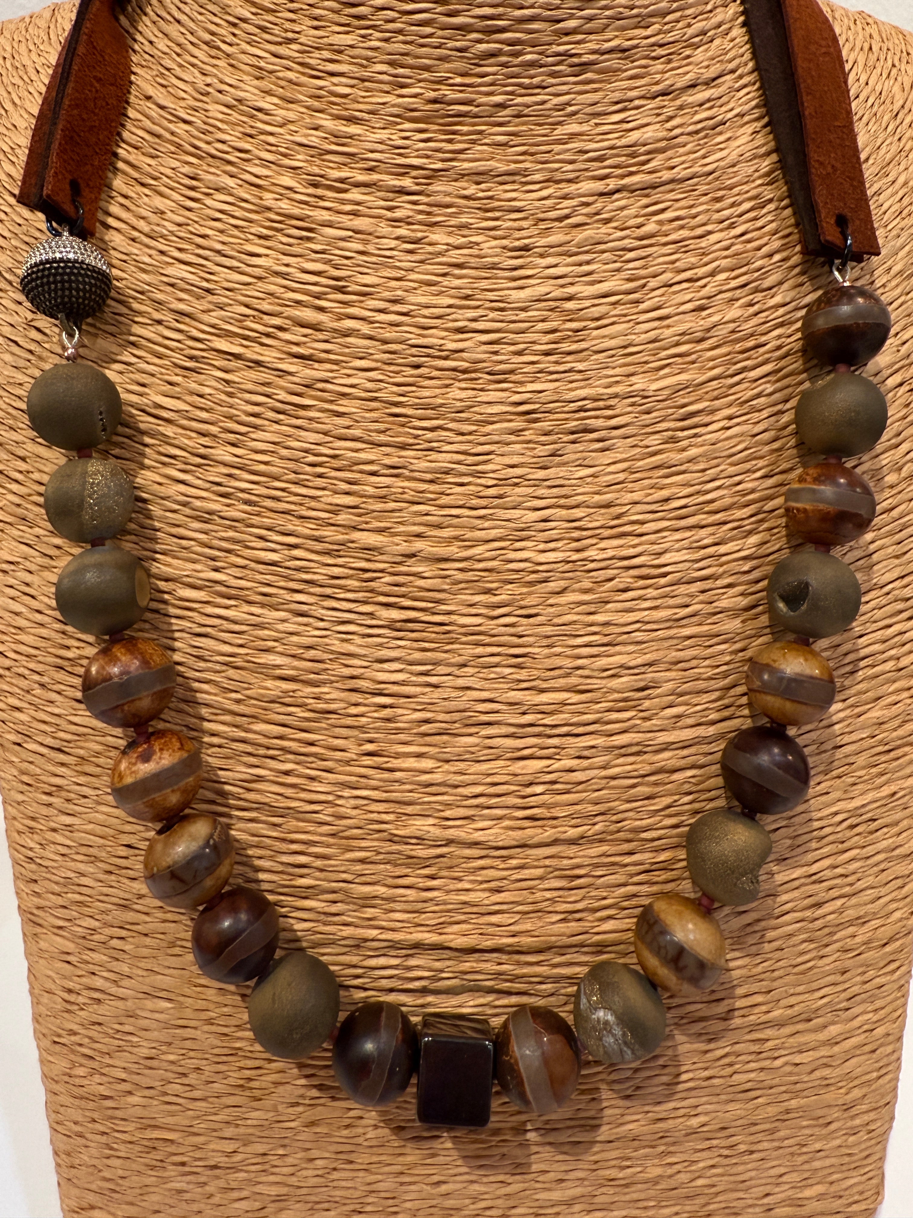 Quartz and agate rounded stone necklace with suede straps dual tone clasp and hematite