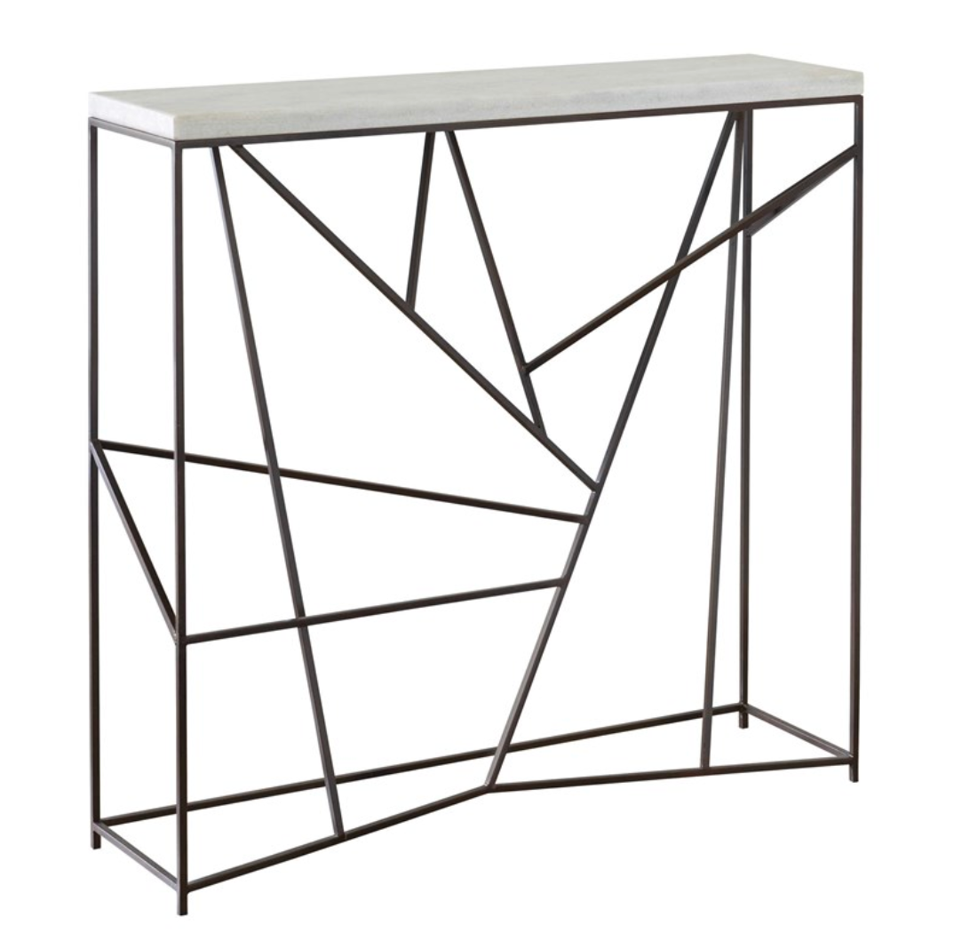 Perfect imperfection and clean design combine to create a stylish console that is a solution for halls and smaller spaces. A well-balanced and seemingly random designed base is clean and modern while still having character. Made of steel in aged black with a honed white marble top.