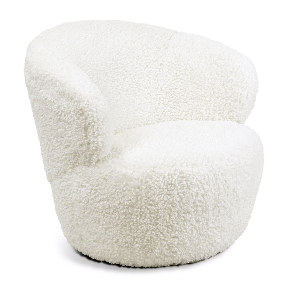 The Myra Chair's soft bouclé faux wool seat and modern, curved form are both cozy and glamorous. She's even complete with a swivel for an easy conversation about the room.